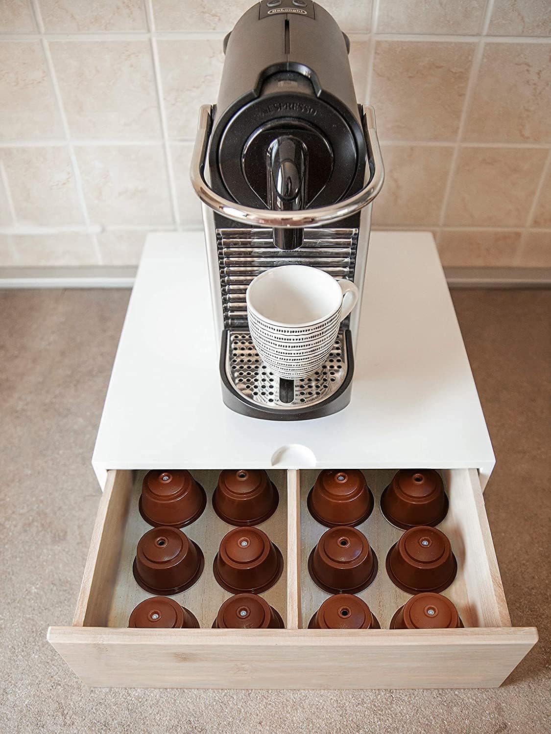 Cajón dispensador de cápsulas